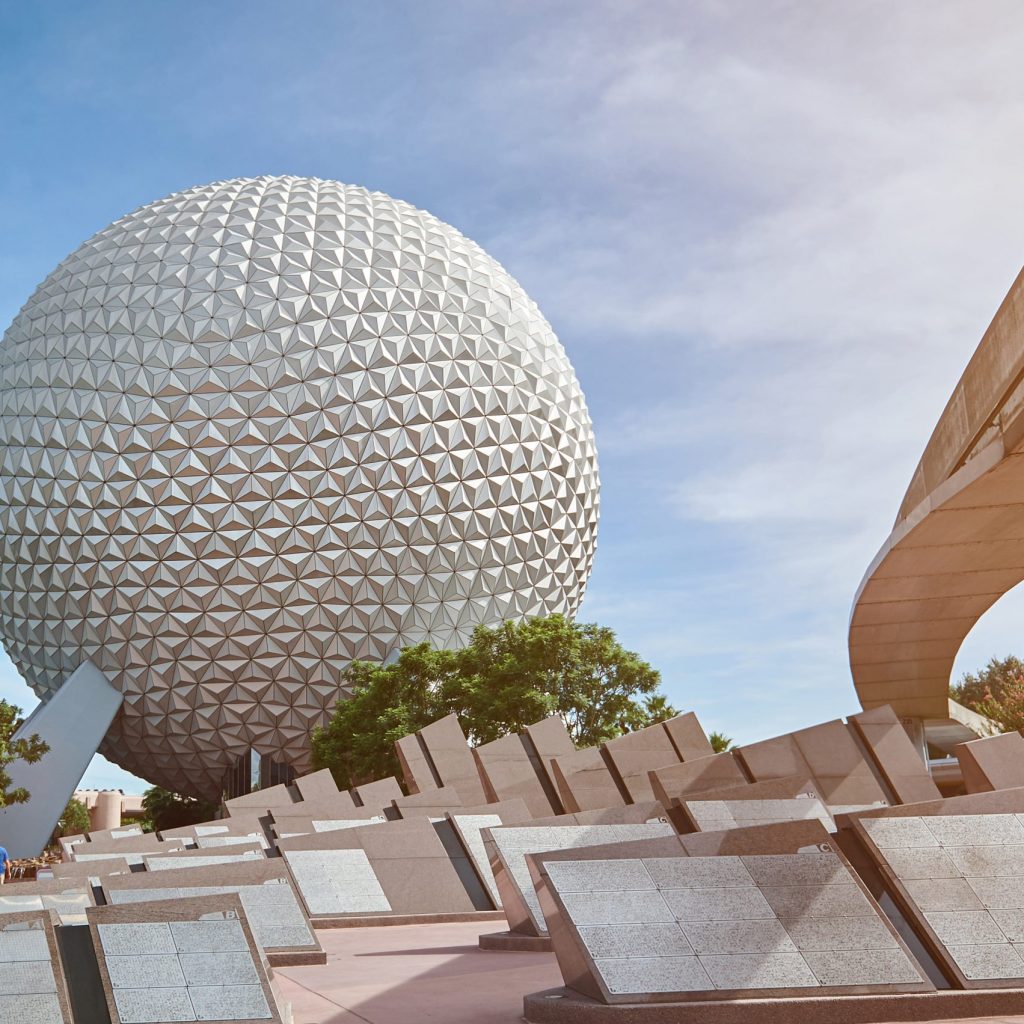 New york, USA - August 30, 2012: Epcot disney park. People playing in big disney world park on sunny day